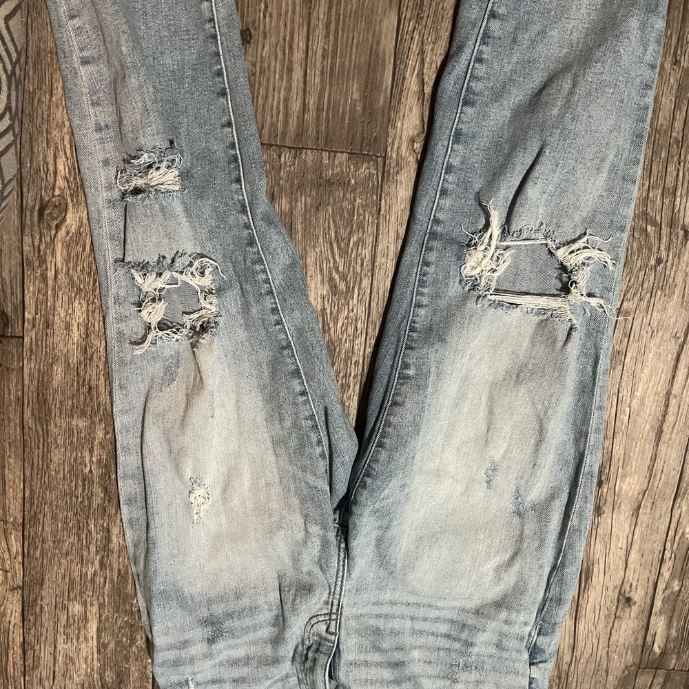 Distressed Light Blue Jeans